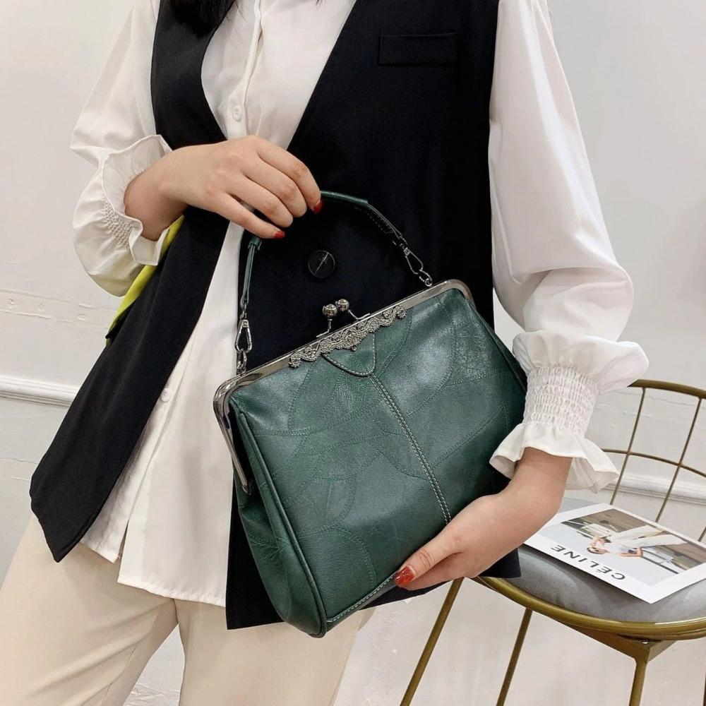 Mila | Timeless Vintage Bag with Elegant Saddle Strap Closure